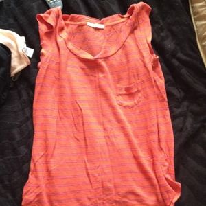 Orange tank with small purple doubled stripes