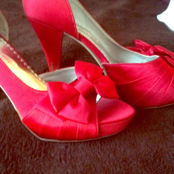 Red Michaelangelo peep toe heels