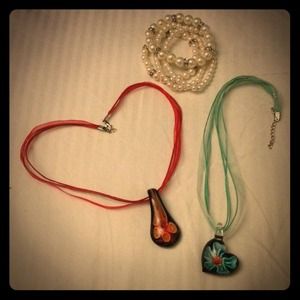 Two ribbon necklaces and costume jewelry bracelets