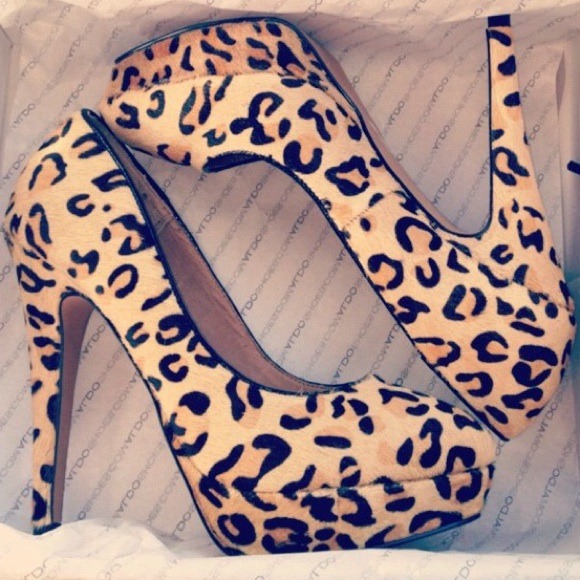 Leopard print faux pony hair heels.
