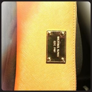 MK wristlet with built in iPhone holder