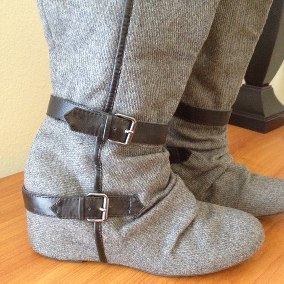 Grey platform boots with brown leather straps