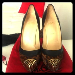 Christian Louboutins leopard/ blk w gold toe sz 38