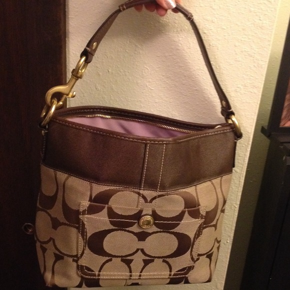 RESERVED. Authentic coach purse