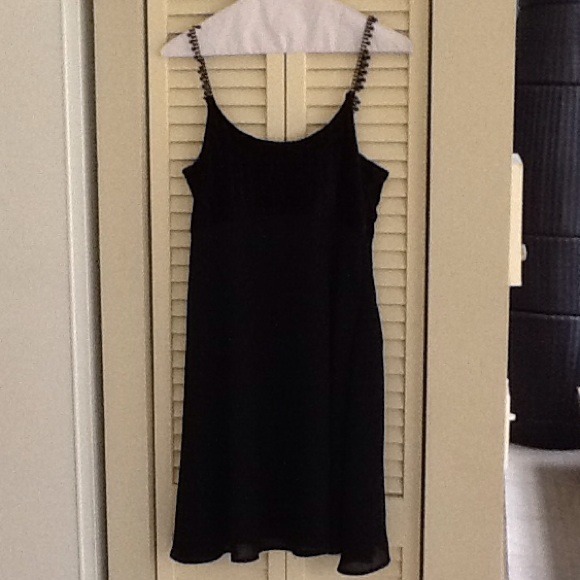 Dresses & Skirts - Night black dress, used twice. Very charming.