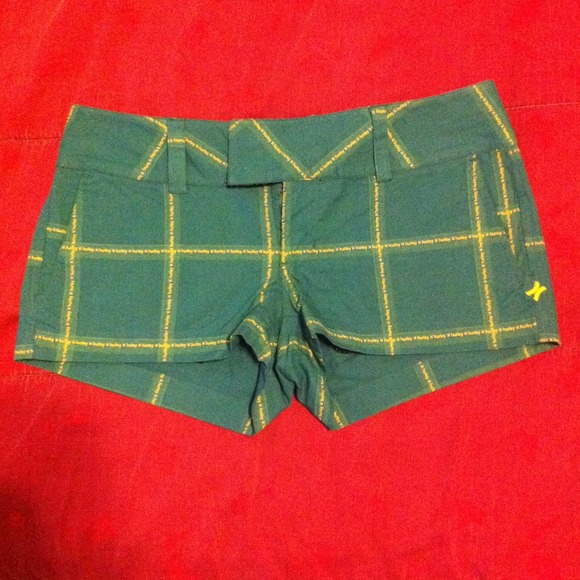 Teal shorts with yellow detail size 5