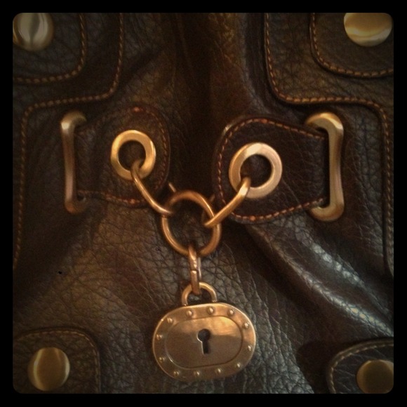 Brown leather purse with brass locks and closures - Picture 1 of 4