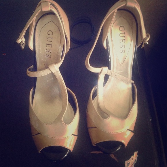 Nude and black peep toe heels