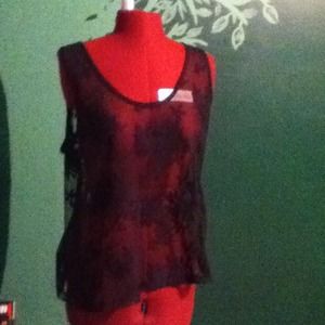 Sheer black top with lace flower detailing