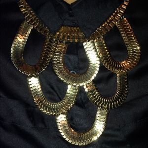 Large gold tone necklace