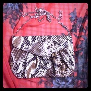Snakeskin clutch with chain strap