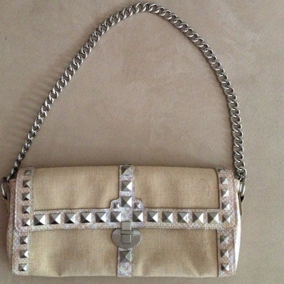 🎀BCBG purse. Tan. Spikes.  Snake print. 🎀