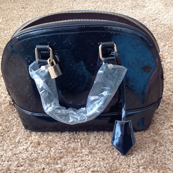 Handbags - Little black bag.
