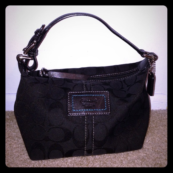 Coach small black handbag with classic Coach logo