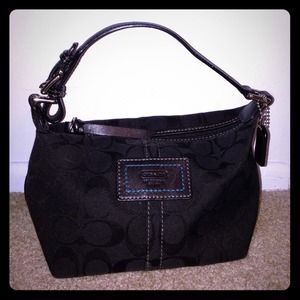 Coach small black handbag with classic Coach logo