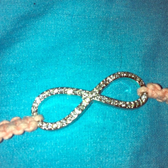 Pink adjustable Infiniti bracelet