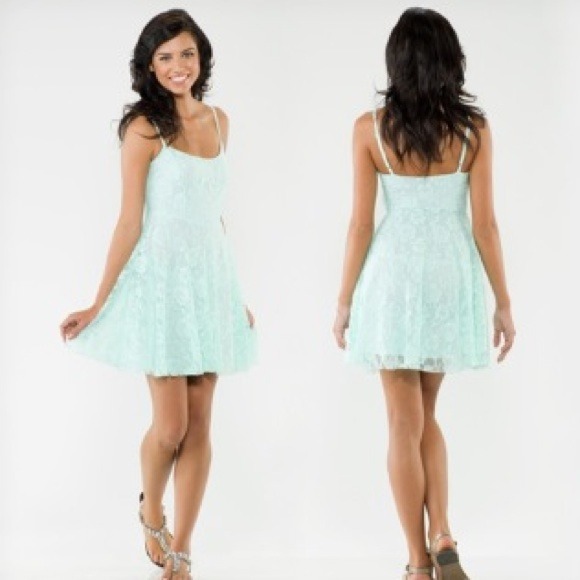 Flirty, mint floral overlay dress!