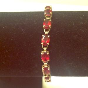 Garnet and 10k Gold tennis bracelet