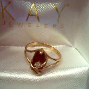 Onyx in 10k Gold with small diamond chip
