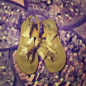 Very comfy light gold colored B.O.C.  flat sandals