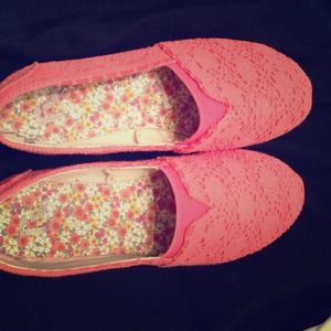 Orange slip ons