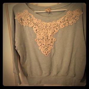 Blue sweat shirt with beautiful appliqué