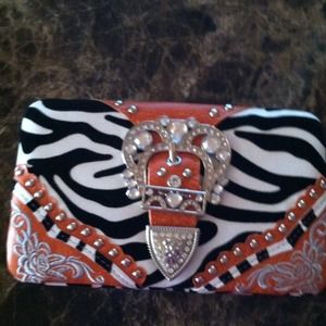 New zebra metal frame wallet with orange accents