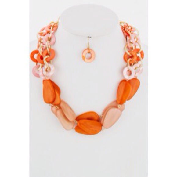 Coral statement necklace with matching earrings