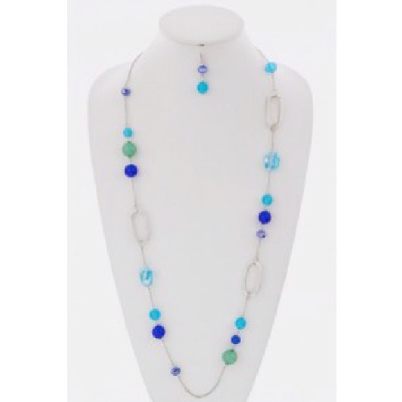 Blue chain necklace with matching earrings