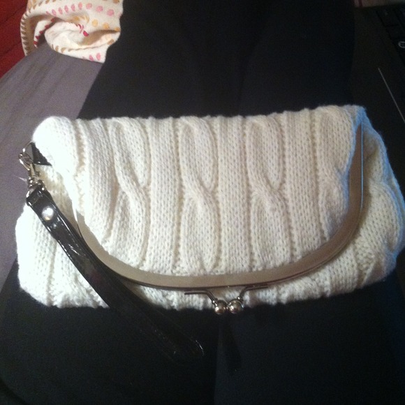 White sweater clutch