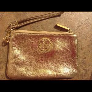 Gold Tory Burch wristlet