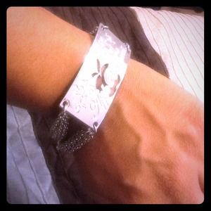 Silver apple bottoms bracelette!