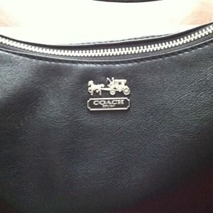 Sold! Bundled with coach Wristlet to bag junkie.