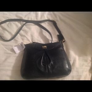 Coach leather purse. Never used with tags on it.