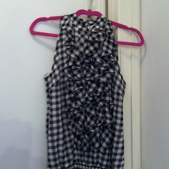 Sleeveless black and white ruffled tank
