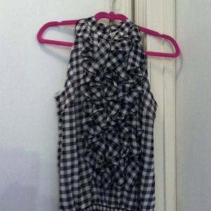 Sleeveless black and white ruffled tank