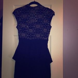 Black and beige peplum dress