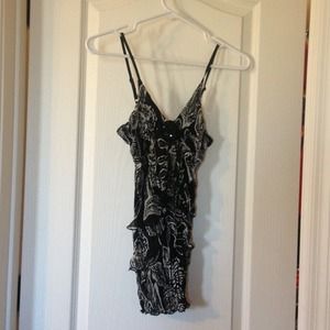 Black and cream ruffled dress top