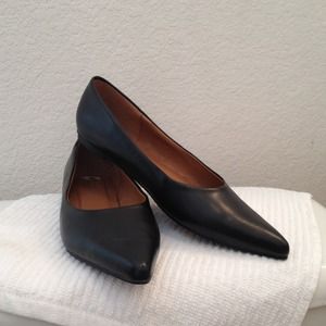 Black pointy flats