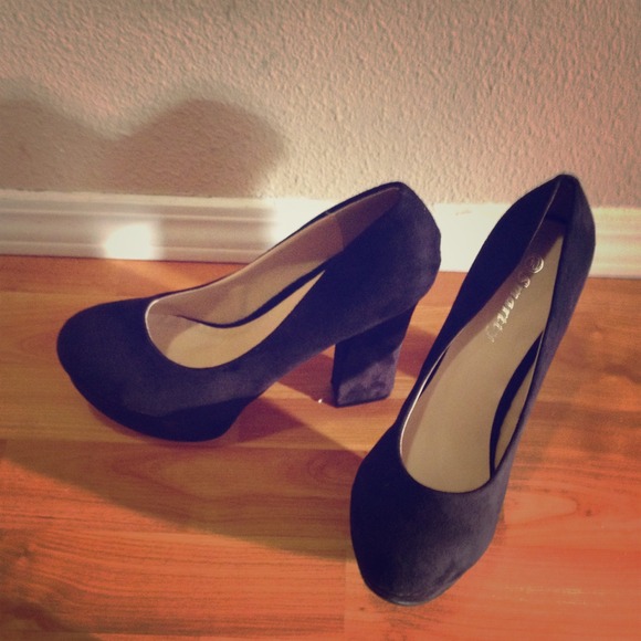 Black platform suede heels. More sizes available.