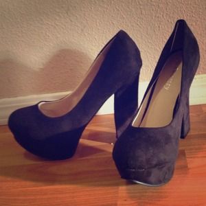 Black suede platform heels.