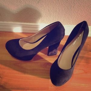 Black suede platform heels. More sizes available.