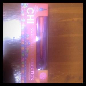 CHI FLAT IRON NEVER BEEN OPENED!!!