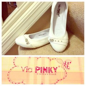 White flats. More sizes available.