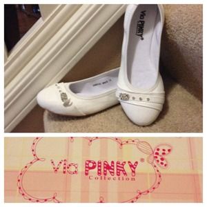 White flats. More sizes available.