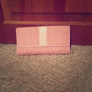 Light pink faux coach wallet