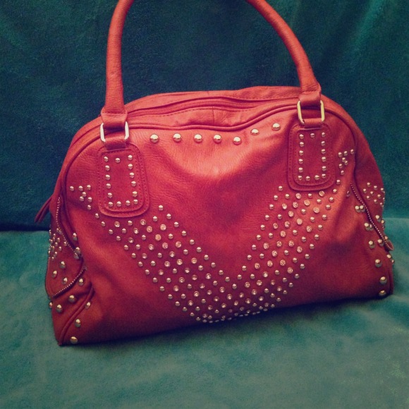 Large bowling bag shaped tote.