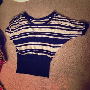 Quarter sleeved black and Creme color shirt