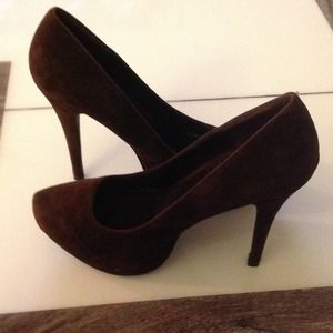 Brown closed toe high heels. Brand New Never Worn