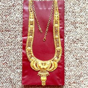 Gold imitation statement necklace.